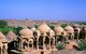 India: Royal cenotaphs (chhatris) at Bada Bagh in the Thar Desert near Jaisalmer
